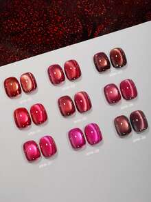 15毫升容量，2026年新款流行新年幸运红猫眼指甲油套装，包含流行玫瑰、鸽血红宝石、果酱紫、金色火龙果水晶石玻璃珠猫眼凝胶指甲油。适合所有季节的美甲，需搭配底油和封层油使用，并需紫外线照射。 - 彩色 - 查看 9