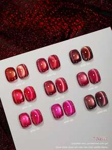 15毫升容量，2026年新款流行新年幸运红猫眼指甲油套装，包含流行玫瑰、鸽血红宝石、果酱紫、金色火龙果水晶石玻璃珠猫眼凝胶指甲油。适合所有季节的美甲，需搭配底油和封层油使用，并需紫外线照射。 - 彩色 - 查看 4