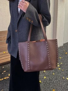 这款黑色大容量通勤手提包是一款时尚的女士单肩包，饰有铆钉。其独特优雅的PU材质设计使其适合约会、日常穿着、购物、海滩度假以及各种其他场合。 - 咖啡 - 查看 2