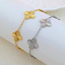 Bộ trang sức thủ công mới hình cỏ bốn lá may mắn bằng thép không gỉ gồm bông tai, dây chuyền và vòng tay. - Nhiều màu - Xem 9