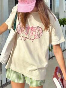 1 件女童休闲蝴蝶印花圆领短袖 T 恤，夏季学生年轻服装 - 粉色蝴蝶结艺术风格 T 恤激发想象力和自我表达 - 杏色 - 查看 2