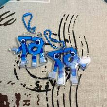 当67像素风格与流行文化玩具的基因相遇，这只蓝白相间的小怪兽便从游戏屏幕跃入现实。它怀旧的马赛克设计，搭配动感十足、伸展开来的双臂，仿佛随时准备给你一个像素风的拥抱。 - 彩色 - 查看 2