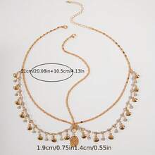 Một chiếc mũ đội đầu hình vỏ sò kiểu Bohemian sành điệu với kim loại, tua rua đính đá và mặt dây chuyền hình tròn không đều. Hoàn hảo cho các cô gái dự dạ hội, đám cưới, tiệc tùng, tụ họp và làm quà tặng cho bạn bè trong dịp Eid Al-Fitr. Phụ kiện tóc tua rua nhiều lớp đính đá lấp lánh kiểu Âu và Mỹ dành cho các cô gái, dây chuyền hình vỏ sò hình học. - Nhiều màu - Xem 7