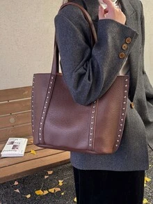 这款黑色大容量通勤手提包是一款时尚的女士单肩包，饰有铆钉。其独特优雅的PU材质设计使其适合约会、日常穿着、购物、海滩度假以及各种其他场合。 - 咖啡 - 查看 4