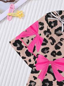 Bộ đồ ngủ tay ngắn họa tiết da báo và nơ dễ thương 2 món cho bé gái, đồ ngủ thường ngày ngọt ngào và thoải mái gồm áo cardigan cổ bẻ và quần short cạp chun, thích hợp mặc hàng ngày, dự tiệc, đi nghỉ mát, có thể giặt máy. - Màu nâu  Mocha - Xem 4