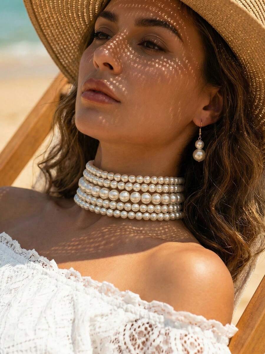 一套简约多层项链，包含1条项链和1对仿珍珠耳环。优雅的仿珍珠颈链+耳环首饰套装，适合女性日常佩戴、参加派对，或作为完美礼物。 - 白色 - 查看 1