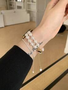 新款奢华简约珍珠表带，兼容 40mm/38mm/41mm表款，适用于Series 10/9/8/7/SE和Series 6/5/4。女士手工多层缠绕表带，兼容表带3/2/1替换装。 - 白金 - 查看 5