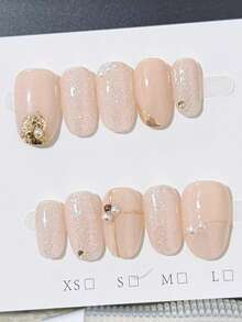 10片手工制作的长椭圆形猫眼香槟色美甲贴纸，金色镶边，珍珠点缀，可重复使用，适合女孩或女士在节日或特殊场合使用。手工制作的按压式美甲贴片。 - 香檳色 - 查看 2