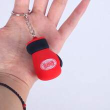 GINGPAI Llavero con colgante de mini guante de boxeo, accesorio de llavero de goma suave con diseño de dibujos animados, decoración de artes marciales, pequeño regalo para fans y estudiantes de boxeo - Multicolor - Ver 11