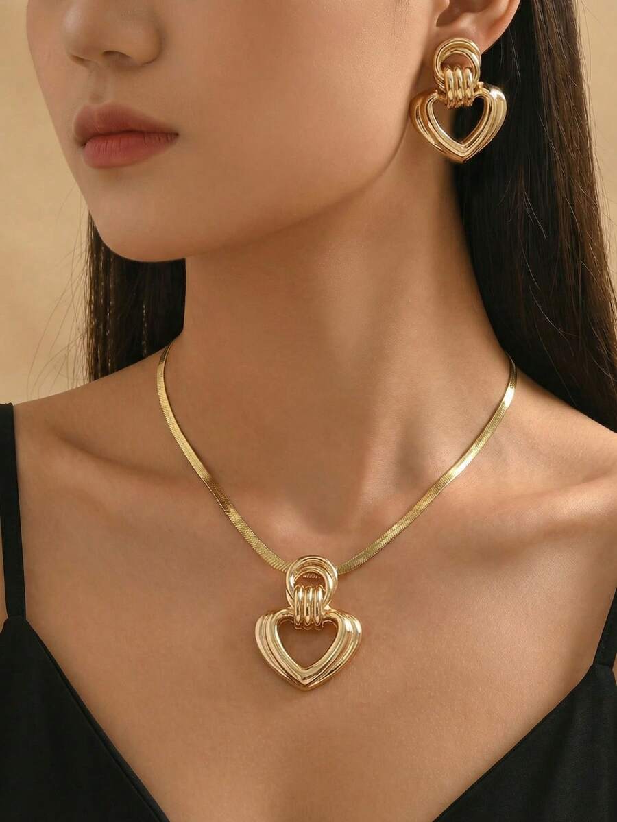Bộ 3 món gồm dây chuyền hình xương rắn bằng kim loại họa tiết trái tim hình học và bông tai hình trái tim, đa năng để đeo hàng ngày. - Vàng - Xem 1