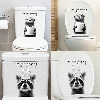 1/2片装可爱黑白水獭浣熊图案马桶贴纸。可移除、自粘、防水PVC材质，适用于马桶座圈、水箱、浴缸、浴室和橱柜装饰。