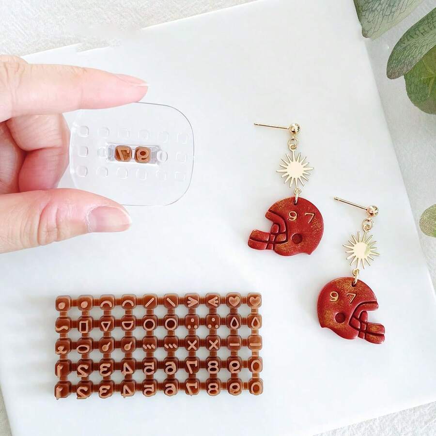 100 piezas de letras + 1 mango transparente Sello de letras de arcilla, Juego de sellos de letras y números de cerámica, Herramienta de arcilla polimérica para hacer joyas - transparente - Ver 1