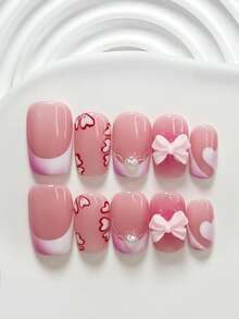 10片装粉色法式亚克力美甲套装，包含3D蝴蝶结装饰、迷你爱心、手绘花卉图案、渐变粉色指甲油，可爱俏皮风格，附赠美甲工具（1个果冻贴纸+1个指甲锉），提供方形、短方形和杏仁形三种指甲形状，手工制作的按压式美甲贴片。 - 彩色 - 查看 13