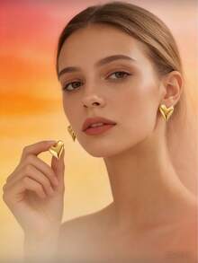 一对可爱清新的不锈钢不对称心形耳环，适合女性在度假、旅行、约会或作为情人节礼物佩戴。 - 彩色 - 查看 3