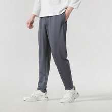 Under Armour Movement Tapered Pants, Knit Loose Fit Casual Pants For Men, 1387435-025 - Grey - View 1