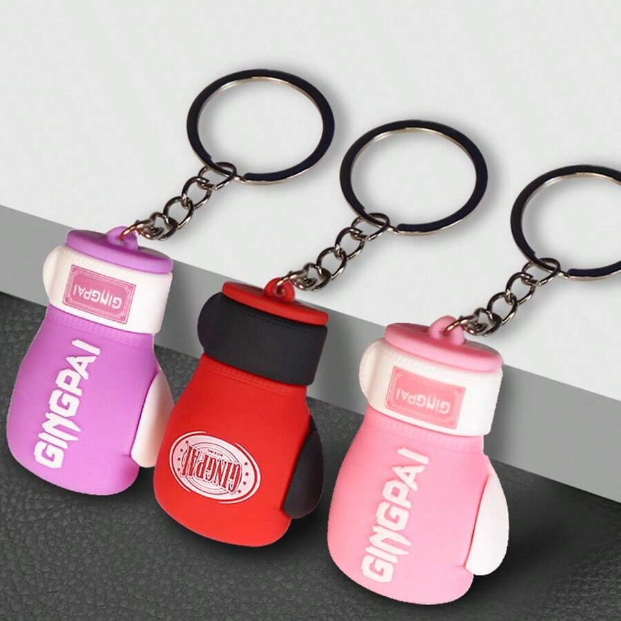 GINGPAI Llavero con colgante de mini guante de boxeo, accesorio de llavero de goma suave con diseño de dibujos animados, decoración de artes marciales, pequeño regalo para fans y estudiantes de boxeo