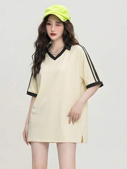 Camiseta polo de manga raglán con raya lateral holgada de vanguardia JUTU primavera/verano 2026, cómoda blusa de manga corta para uso al aire libre