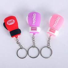 GINGPAI Llavero con colgante de mini guante de boxeo, accesorio de llavero de goma suave con diseño de dibujos animados, decoración de artes marciales, pequeño regalo para fans y estudiantes de boxeo - Multicolor - Ver 9
