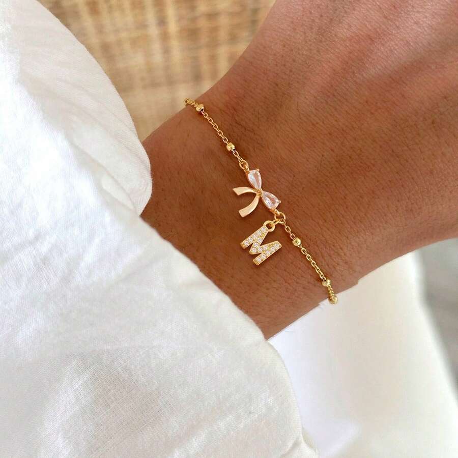 1件装时尚简约字母蝴蝶结吊坠金色不锈钢珠链手链（女士款） - 金黃色 - 查看 1