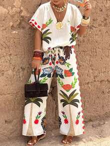 Magic Mia Women's Tropical Floral Print Two-Piece Set - V Neck Batwing Sleeve Top & High Waist Wide Leg Pants | Casual Loose Fit For Beach Vacations, Resort Getaways, Summer Brunch, Coastal Walks, Music Festivals & Boho Market Trips (Vibrant Palm & Flower Print & Drawstring Waist) For Effortless Vacation & Everyday Styling - 白色 - 查看 2