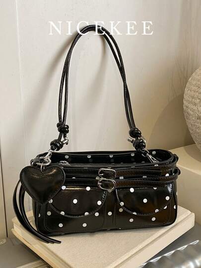 时尚波点优雅日常单肩包，小巧轻便的心形吊坠斜挎包，简约精致的多口袋腋下包，适合购物、通勤、日常出行和约会。