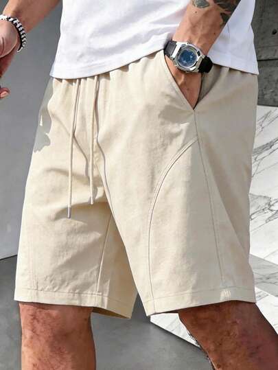 男士藏蓝色抽绳短裤，金属抽绳，轻盈顺滑，透气凉爽，抗皱耐穿，宽松休闲百慕大短裤，适合夏季通勤、外出和运动。