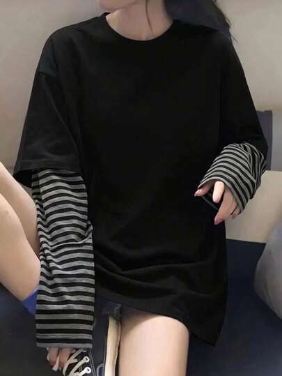 Áo thun nữ JUTUQU mùa xuân màu đen kẻ sọc phối tay, kiểu dáng đa năng, cổ tròn, tay dài, thích hợp mặc đi dự tiệc năm 2026, phong cách thường ngày.