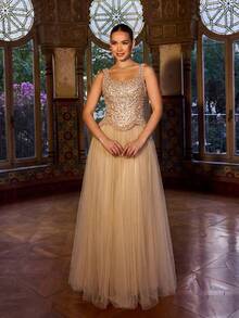 Faeriesty Đầm dạ hội nữ màu sâm panh đính sequin và hạt cườm, áo không tay cổ vuông ôm sát kết hợp với chân váy maxi xếp tầng bằng vải lưới, thiết kế eo tinh tế, phong cách sang trọng, phù hợp cho các bữa tối trang trọng, sự kiện thảm đỏ, dạ tiệc từ thiện, đám cưới và các dịp trang trọng khác. Thích hợp cho mùa xuân. - Rượu sâm banh - Xem 9