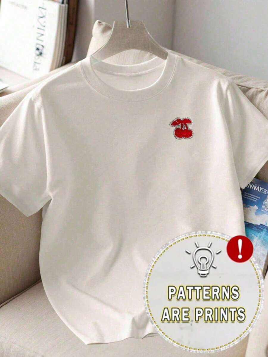 Camiseta de verano holgada y adelgazante con estampado de cerezas para mujer, versátil, de cuello redondo y manga corta, agradable al tacto, transpirable, para uso diario y casual. - Blanco - Ver 1