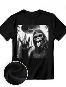 Camiseta Divertida para Hombre con Diseño de Gorila y OVNI - 100% Algodón, Negra, Casual, con Dibujo de Simio, Nave Espacial Alienígena y Gesto con la Mano - Camiseta de Manga Corta con Humor para Fiestas, Ropa Casual y Eventos Temáticos (Corte Regular) - Negro - Ver 3