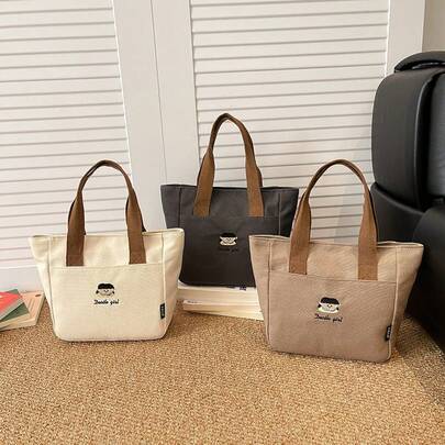 1PC Simple And Stylish Commuter Design, Thick Canvas Tote Bag, Suitable For Daily Use, Versatile And Portable, Perfect For Students To Carry Lunch Boxes.