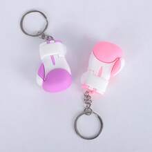 GINGPAI Llavero con colgante de mini guante de boxeo, accesorio de llavero de goma suave con diseño de dibujos animados, decoración de artes marciales, pequeño regalo para fans y estudiantes de boxeo - Multicolor - Ver 10
