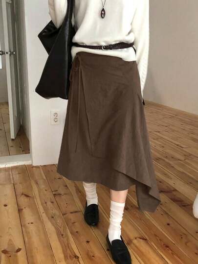 女士纯色不对称A字褶裥半身裙，时尚