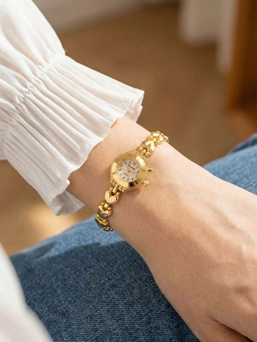 1款女士金色不锈钢奢华石英腕表,心形链节设计,小表盘数字刻度,适合正式和休闲场合,可作为生日礼物、情人节礼物、节日礼物、周年纪念礼物送给女性。 - 金色 - 查看 1