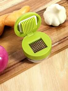 1件装重型蒜蓉压榨器/切碎器 - 手动压蒜切碎器，带易清洁切碎盘，紧凑型手持设计，塑料材质，可压蒜瓣（否） - 可用洗碗机清洗 - 彩色 - 查看 6