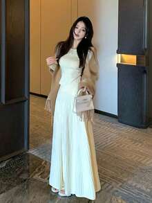 Y6Y Bộ đồ hai mảnh kiểu Pháp lãng mạn năm 2025 gồm áo len và chân váy dài, mang đến vẻ ngoài ấm áp, sang trọng và thoải mái cho đầu xuân/thu. - Màu be - Xem 7