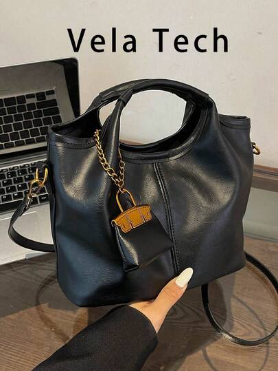 2026年新作 ファッション レディースショルダーバッグ、大容量通勤バッグ、ニッチデザインクロスボディバッグ、カジュアル 多用途 ミニマリストスタイリッシュハンドバッグ、快適なPU素材、無地デザイン、スナップ式開閉、ジッパー開閉、取り外し可能な調節可能なストラップ、ゆとりのある容量、バケツバッグ