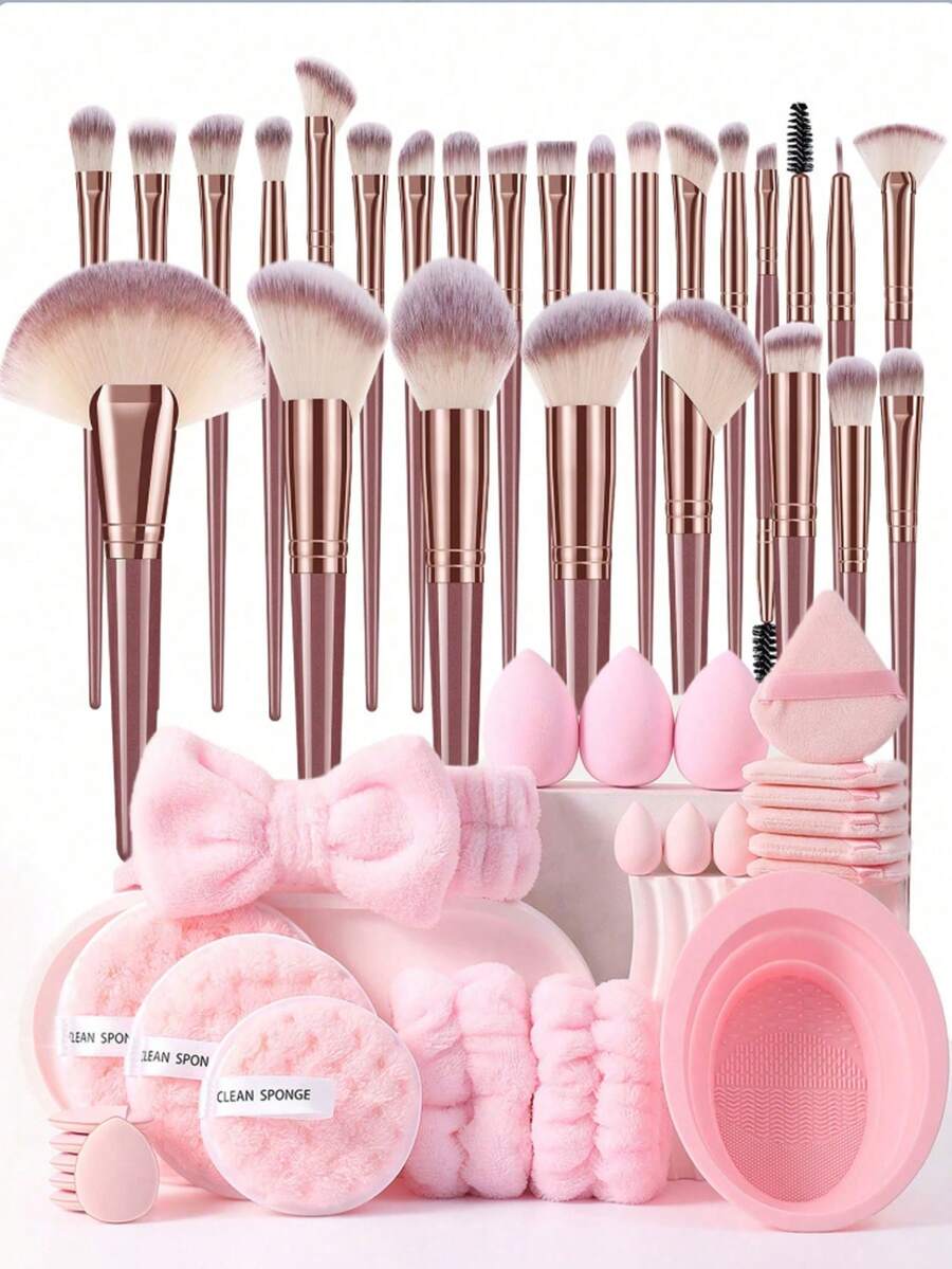 49件套化妆工具套装，包括：26支化妆刷套装+3个化妆海绵+3个迷你化妆海绵+6个三角粉扑+6个迷你气垫粉扑+1个发圈+2个手碗挂绳+1个化妆刷清洁工具+3个洁面海绵 - 粉色 - 查看 1