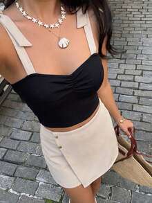 Bộ đồ thể thao mùa hè dành cho nữ, gồm áo hai dây thiết kế thắt nút ở vai và quần short. - Màu be - Xem 5