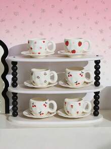 1个樱桃草莓陶瓷马克杯，杯身采用不规则浮雕设计，可用作早餐咖啡杯、卡布奇诺杯、下午茶杯、红茶杯，大容量水杯，是送给女朋友、母亲节或结婚的理想礼物。 - 彩色 - 查看 9