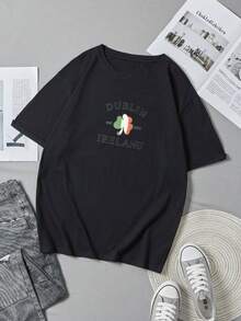 Men's T-Shirt, Women's T-Shirt,  St Patrick's Day Themed Designs Featuring,  Dublin Ireland Text With Shamrock Design In Green White And Orange Colors Centered On Black T Shirt Background Featuring Classic Typography And National Symbolism Representing Irish Heritage And Culture Comfortable And Versatile Outdoor Casual Short Sleeve - Negro - Ver 5