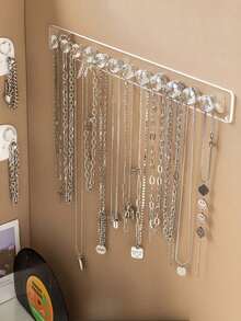 1 chiếc giá treo trang sức trong suốt gắn tường - Giá trưng bày nhiều móc cho vòng cổ, vòng tay và bông tai - Lý tưởng cho bàn trang điểm, tủ và ký túc xá, hoàn hảo cho việc cất giữ đồ dùng của phụ nữ, du lịch, trang trí mùa thu và trang trí Halloween. - Nhiều màu - Xem 3