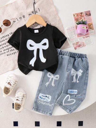 2pcs Baby Girl Casual Set: Bow Print Black Round Neck Short Sleeve T-Shirt Top And Bow Ripped Heart Letter Print Elastic Waist Light Denim Long Pants