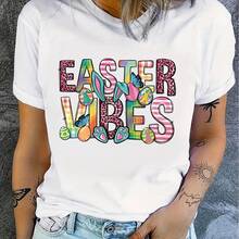 T-shirt imprimé graphique de Pâques pour grandes tailles - Top décontracté à col ras-du-cou et manches courtes avec un design vibrant aux couleurs de Pâques, œufs colorés et fleurs, coupe confortable et extensible, lavage machine, vêtements de printemps et d'été pour les fêtes, t-shirts pour femmes, tenue festive, design ludique, tissu durable - Blanc - Voir 1
