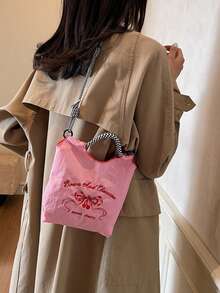 Bolso de tela de nailon con bordado de mariposa, estilo dulce de niña. Bolso de hombro con correa tejida en blanco y negro. - Rosa - Ver 5