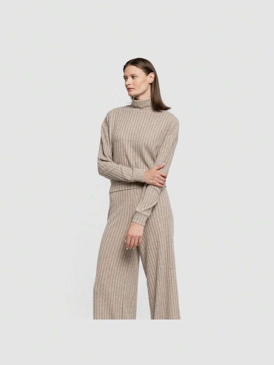 Tramas+ Women's Beige High Neck Crop Top, 4x2 Ribbed Knit, Ideal For A Comfortable And Versatile Look, Premium Polyester And Viscose Composition, Available In Sizes S To XL, Perfect To Combine With Trousers And Sweatshirts, Plain Color Design For A Sophisticated And Modern Style, Elastic Material For Greater Comfort And Perfect Fit. - Beige - View 1