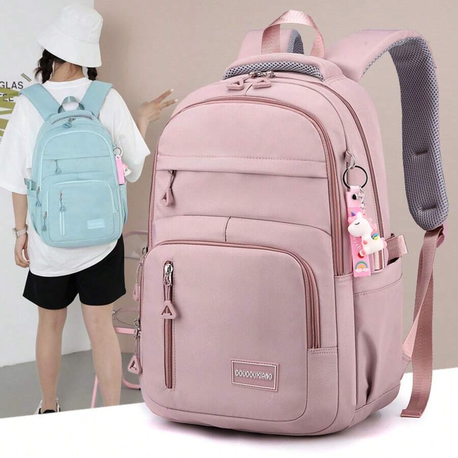 Mochila Escolar Savoyette Rosa de Nylon Resistente, Diseño Espacioso con Múltiples Bolsillos, Correas Acolchadas Ajustables y Llavero de Unicornio, Ideal para Estudiantes, Adolescentes y Jóvenes, Perfecta para Uso Diario, Clases, Viajes Cortos y Salidas con Amigos, Regalo Premium en Celebraciones como Día de la Madre, Día de San Valentín, Navidad, Año Nuevo, Día de los Muertos, Grito de Independencia, Cyber Monday, Semana Santa, Graduaciones, Fiestas de 15 Años, Aniversarios y Día Internacional de la Mujer
