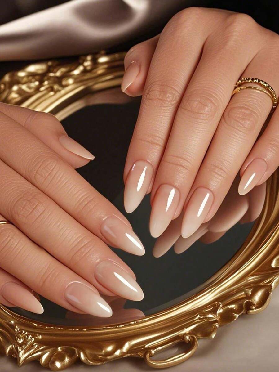 Bộ 30 miếng dán móng tay hình hạnh nhân tối giản. Chất liệu cao cấp, màu hồng nhạt ombre kiểu Pháp, thiết kế phủ kín toàn bộ móng. Thích hợp làm quà tặng cho phái nữ, dùng cho tiệc tùng hoặc đi làm hàng ngày. Bao gồm 1 băng dính hai mặt và 1 dũa móng. Màu thạch ngẫu nhiên. - Màu Hồng baby - Xem 1