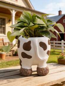 可爱的奶牛造型树脂花盆，底部有排水孔，是室内外皆宜的可爱动物造型多肉植物盆栽，充满奇趣的农舍风格，可摆放在书桌、窗台、露台、花园等处，非常适合种植仙人掌、香草、小型植物，是送给植物爱好者和家居装饰爱好者的独特礼物，经久耐用且轻巧。 - A - 查看 7