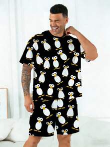 Conjunto de pijama para hombres talla grande | Parte superior de cuello redondo y manga corta, y pantalón corto casual con cintura elástica, conjunto de 2 piezas | Tela de punto de poliéster suave y transpirable, corte holgado | Diseño casual con estampado de pingüinos de ojos grandes - Negro - Ver 7